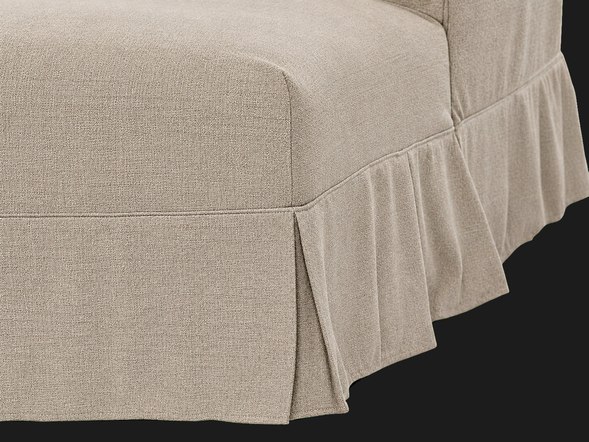 Dalia 4-piece chaise sectional — pleated skirt detail in Performance Textural Weave Earthen