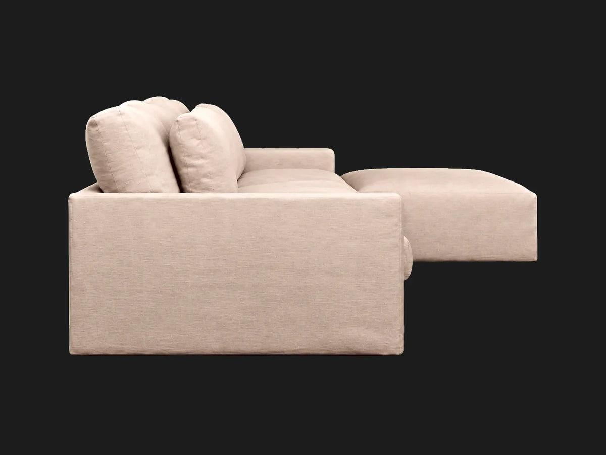 Devyn 4-piece chaise sectional — side view in Performance Linen Weave Beige