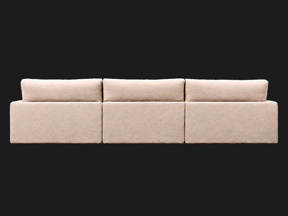 Devyn 4-piece chaise sectional — rear view in Performance Linen Weave Beige