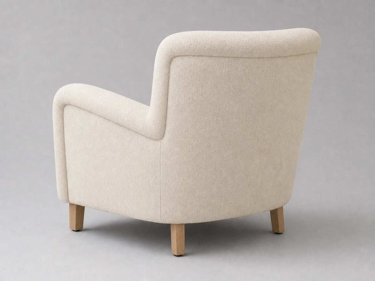 E25924378586 lounge chair rear 45-degree view in Italian Brushed Wool Vanilla
