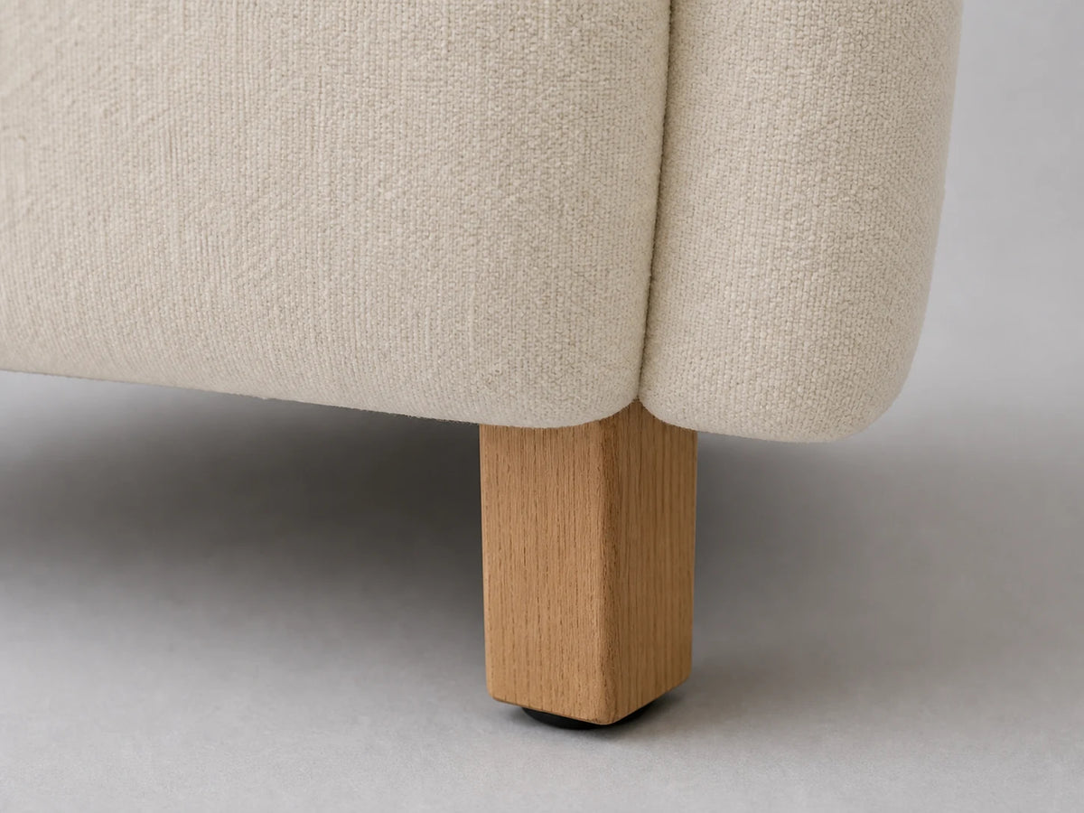 E25924378586 lounge chair leg detail in Italian Brushed Wool Vanilla