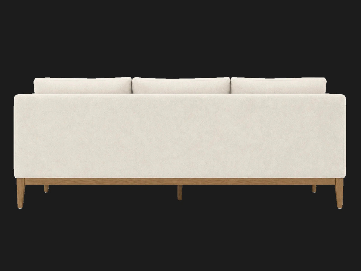 E310952588 sofa back view in Italian Brushed Wool Vanilla with oak base