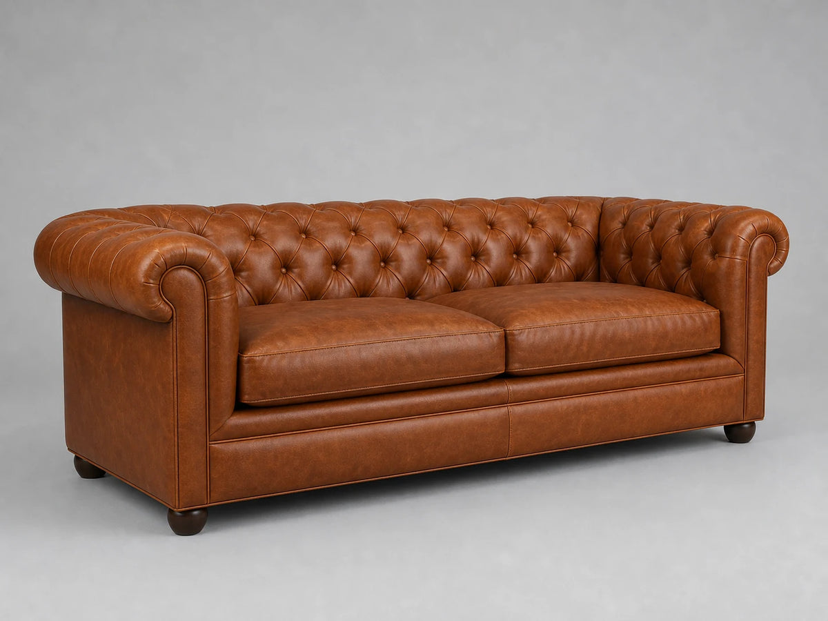 Chesterfield sofa 45 degree left view in cognac leather