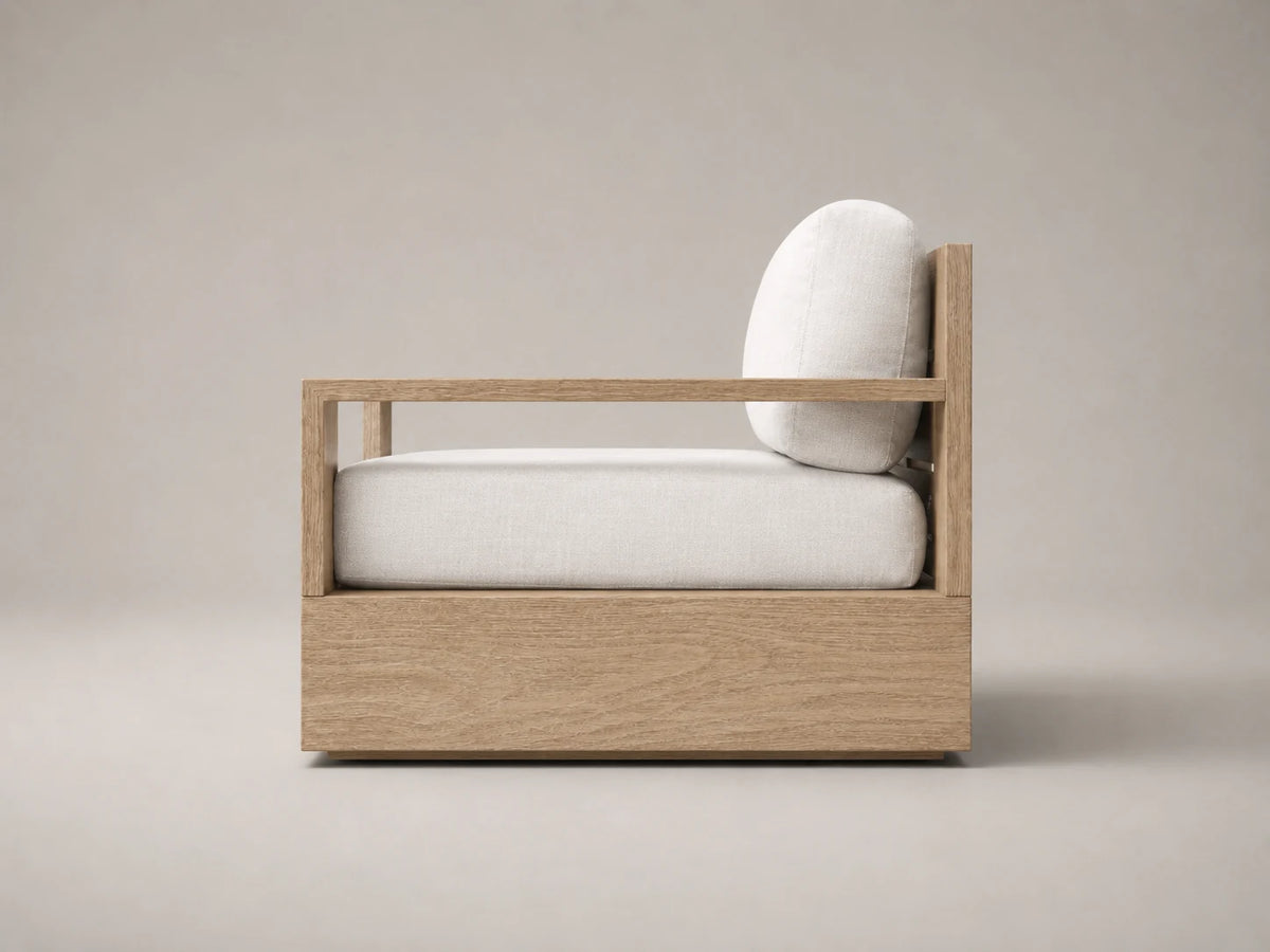 Outdoor teak lounge chair, side view