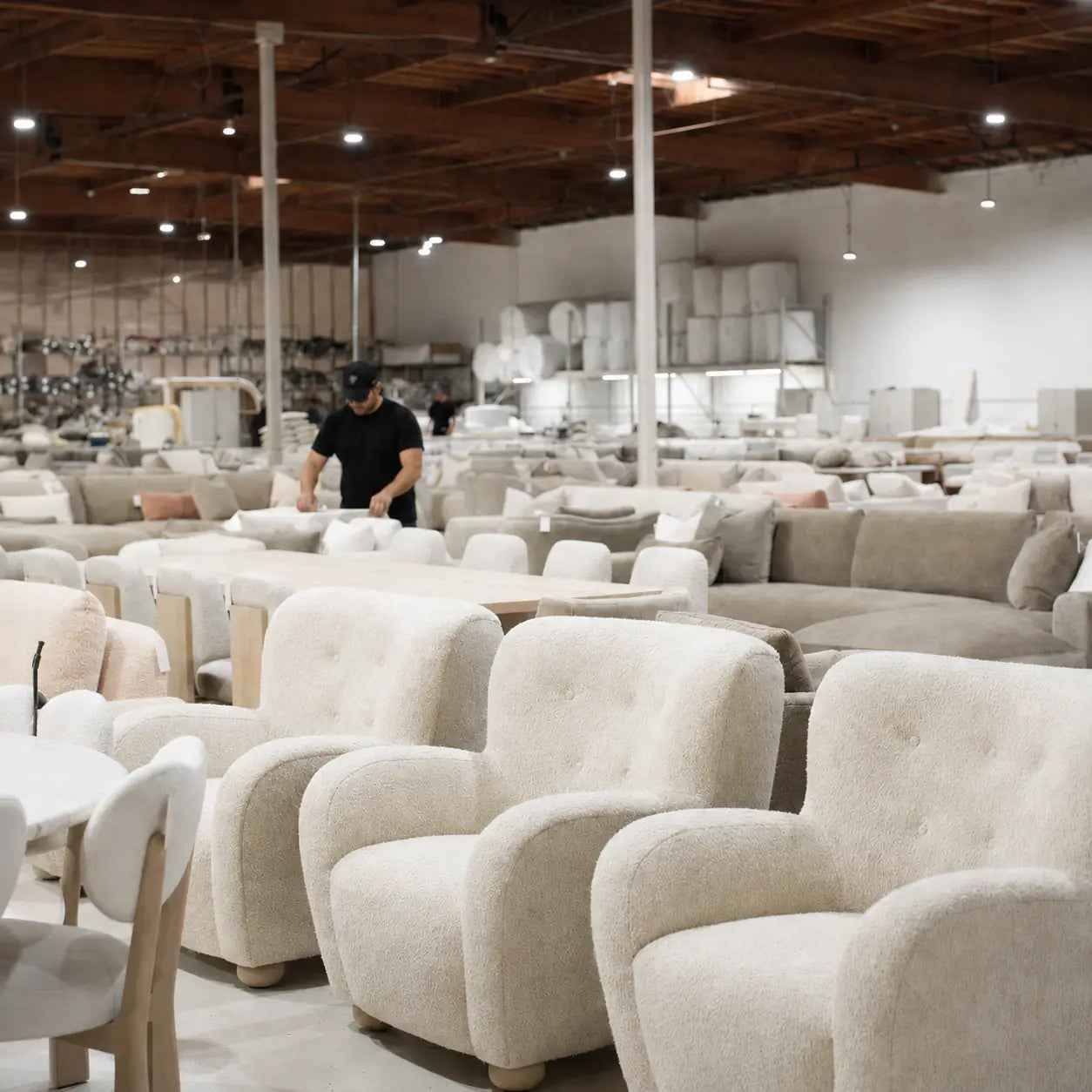 Finished furniture staging and release review in workshop