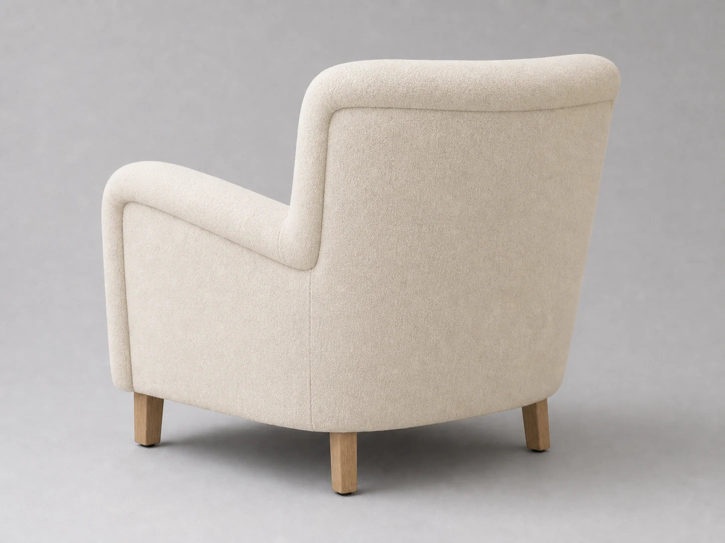 E25924378586 lounge chair rear 45-degree view in Italian Brushed Wool Vanilla