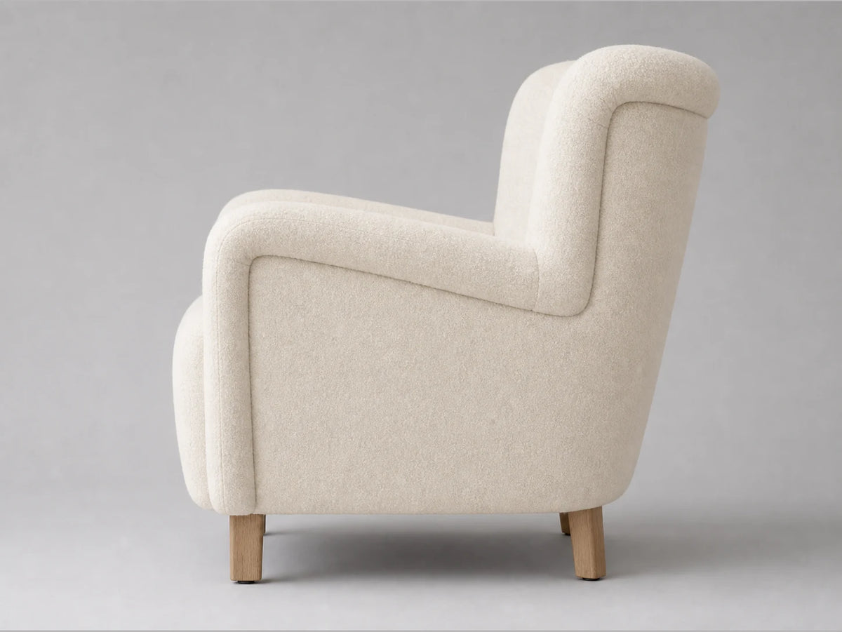 E25924378586 lounge chair side view in Italian Brushed Wool Vanilla