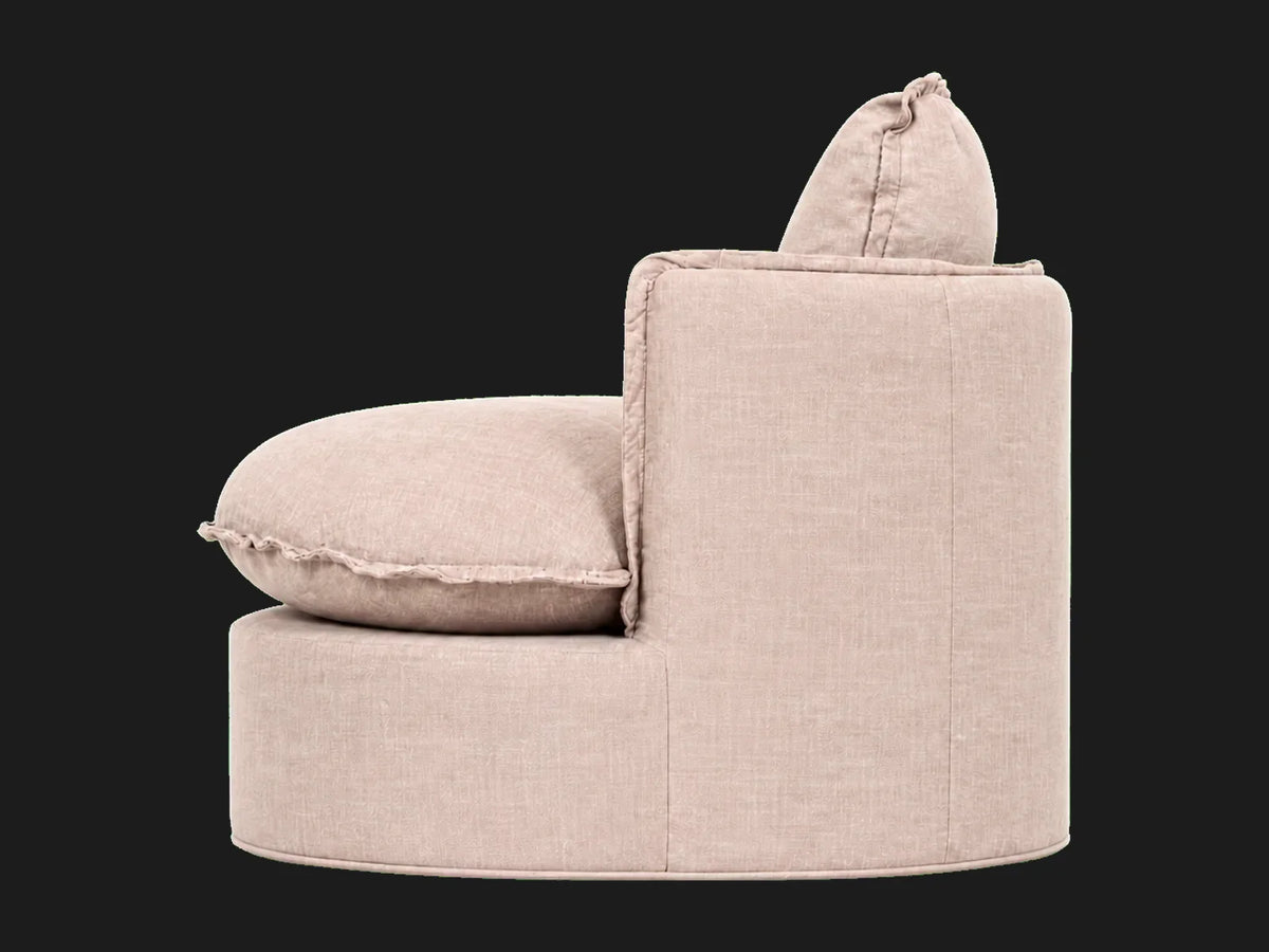Neva Round Swivel Chair in Heritage Belgian Linen Petal, angled view