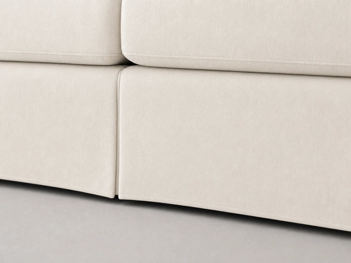 FRANK-RHR-019 sofa detail skirt base view in Italian Brushed Wool Vanilla