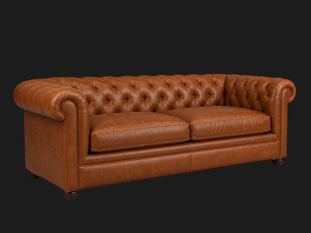 Chesterfield sofa 45 degree left view in cognac leather