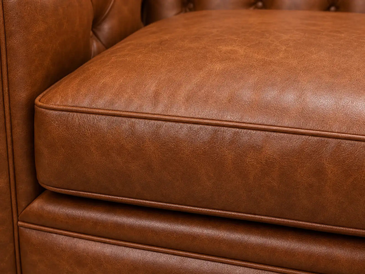 Chesterfield sofa cushion edge detail in cognac leather