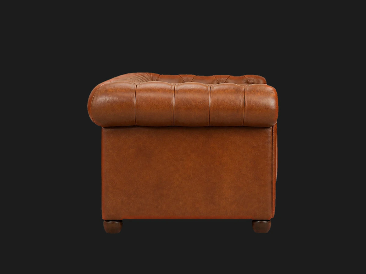 Chesterfield sofa side view in cognac leather