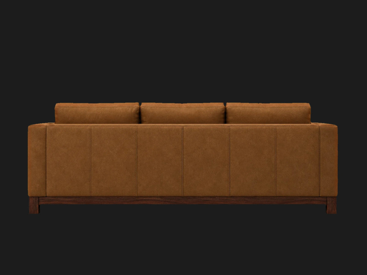 Jake sofa back view in Nubuck Leather Saddle with walnut finish
