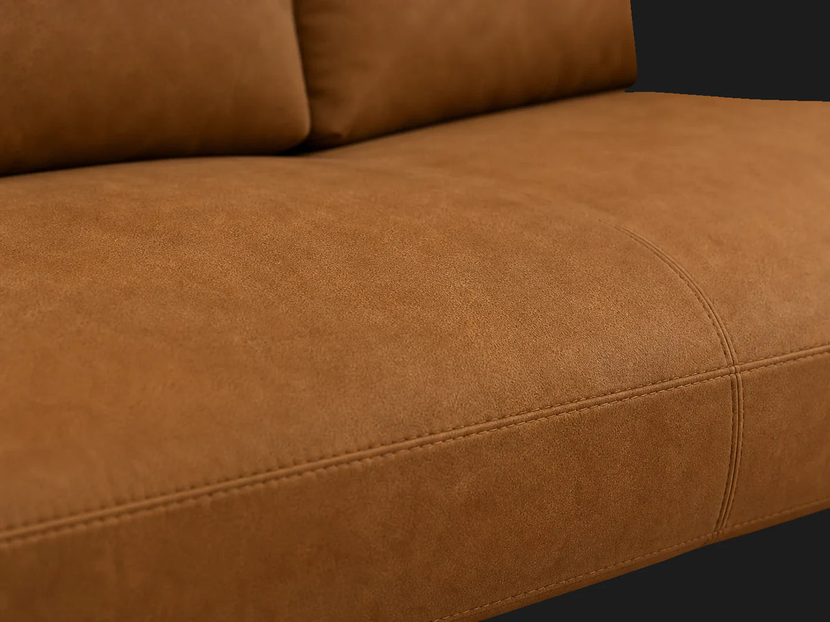 Jake sofa leather detail in Nubuck Leather Saddle with walnut finish
