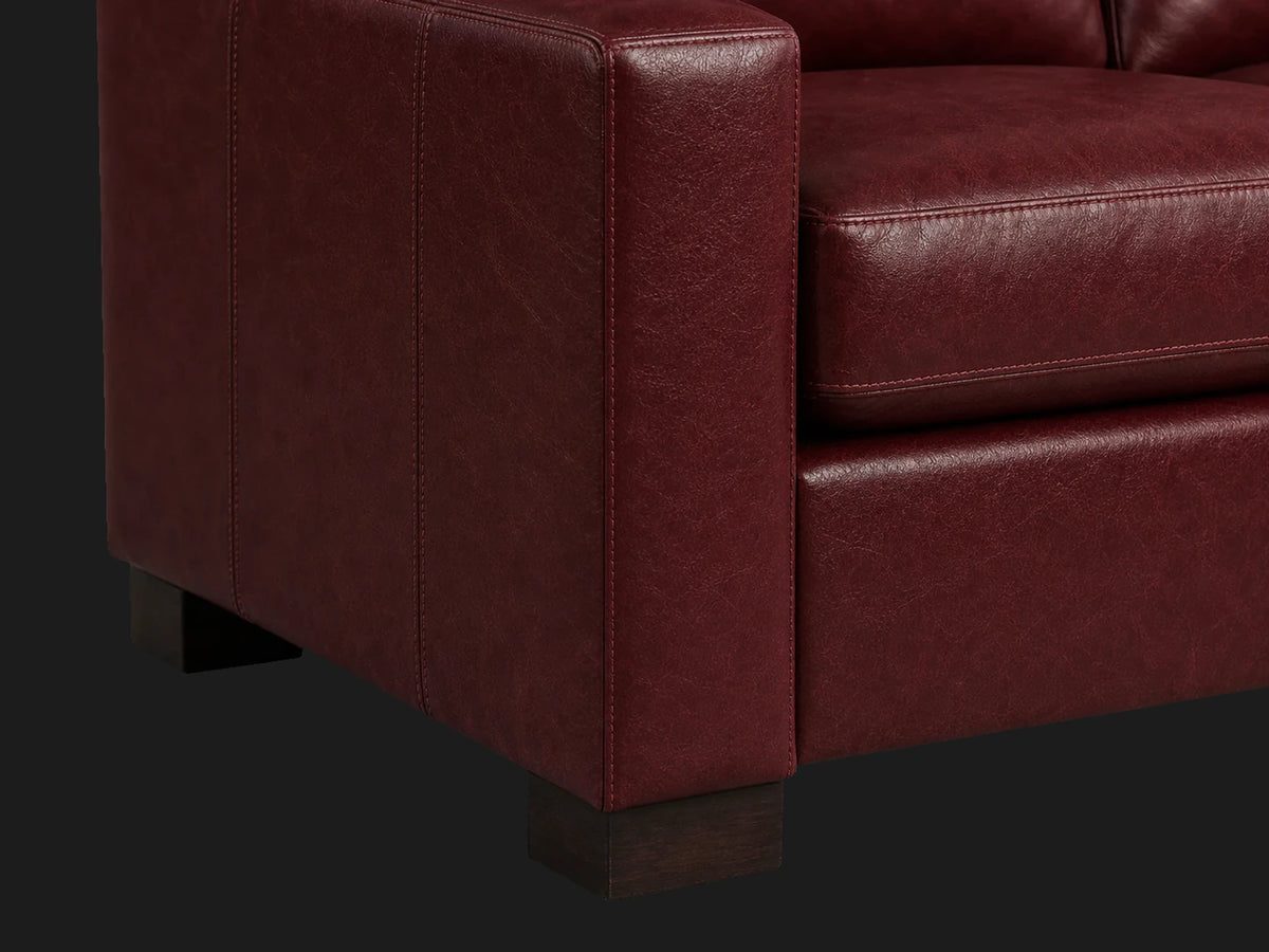 Turner sofa leg and arm detail in Oxblood aniline leather