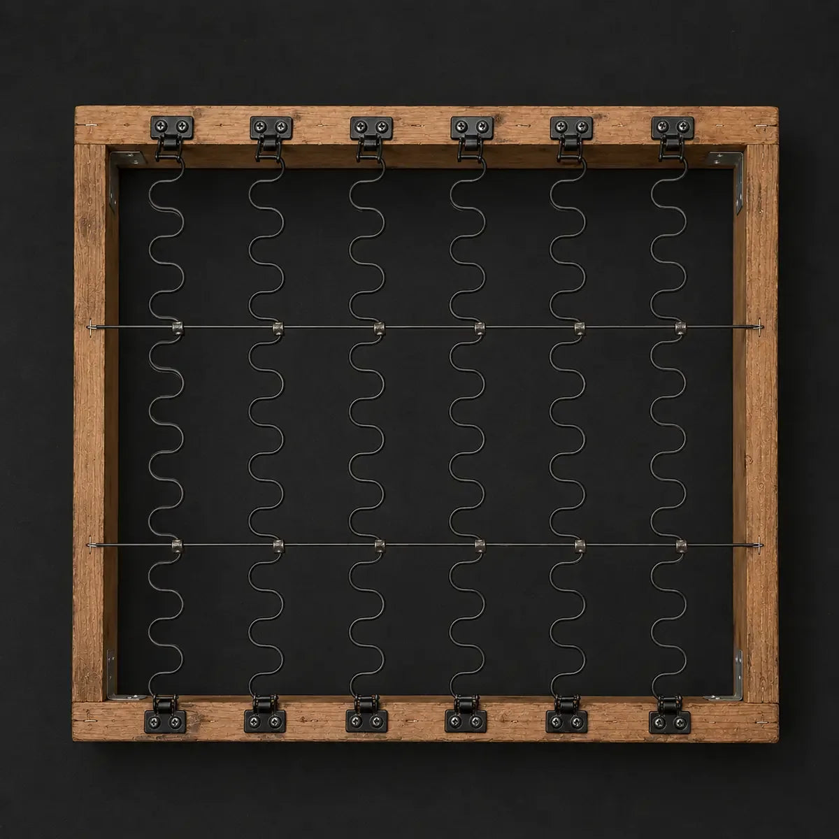 Sinuous spring grid mounted inside a wood furniture frame
