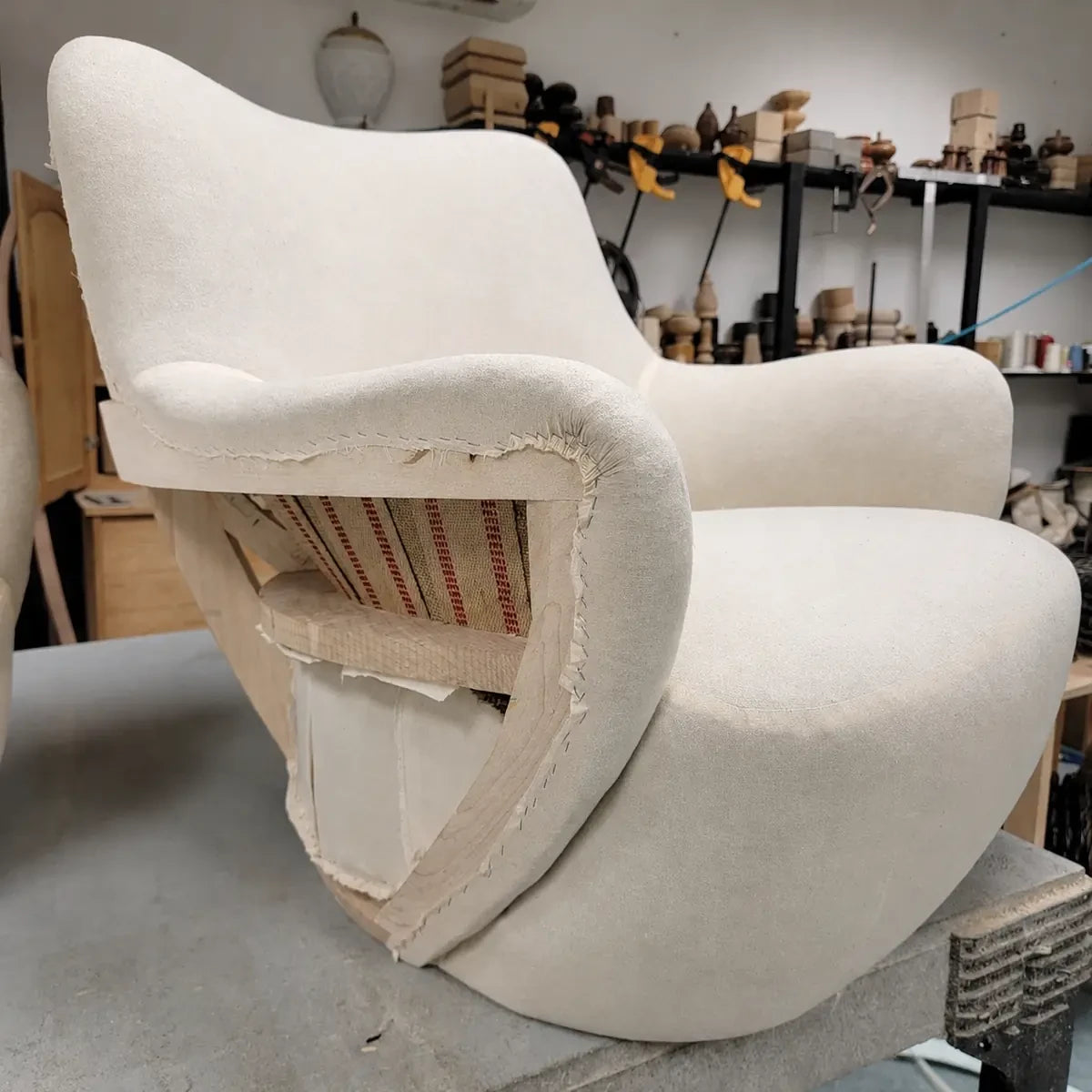 Upholstery edge pull and staple control detail